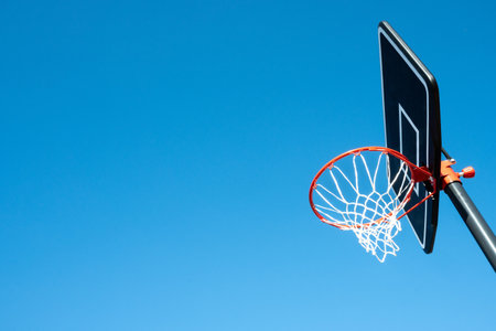 Basketball and blue sky backgroundの写真素材