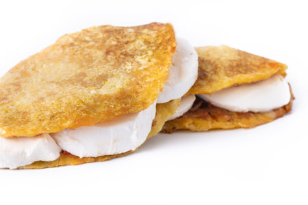 Traditional Venezuelan beef cachapa isolated on white backgroundの写真素材