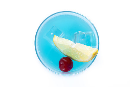 Deep blue sea martini cocktail isolated on white background.の写真素材