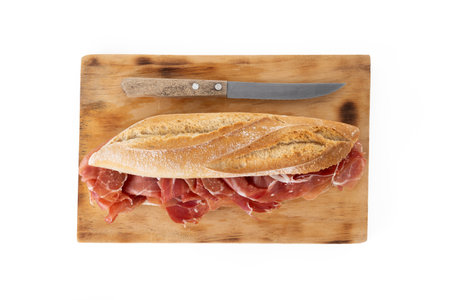 Spanish serrano ham sandwich isolated on white backgroundの写真素材
