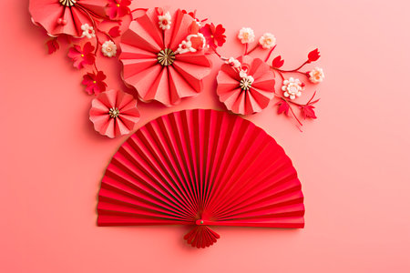 Stylish Red paper fan, circle, and red blossom, and on pink background. Chinese new year decoration. Traditional Japanese style. Copy spaceの素材