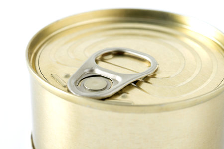 Various canned food in metal cans isolated on white background