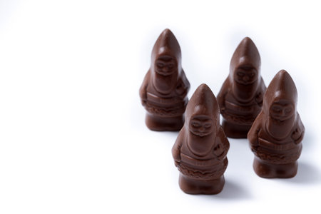 cheerful wrapped chocolate Santa Claus isolated on white backgroundの写真素材