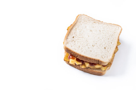 Traditional British chip butty (french fry sandwich) isolated on white background