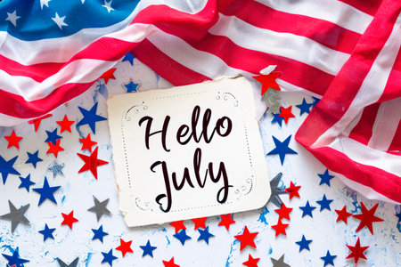 united states flag background with a hello july noteの素材