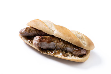 Traditional choripan, Argentina sandwich with chorizo and chimichurri sauce. isolated on white backgroundの写真素材