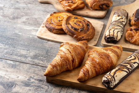Set of bakery pastries on wooden tableの写真素材