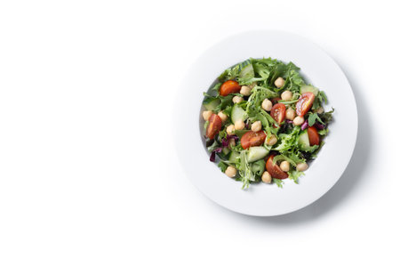 Healthy chickpea salad with tomato, lettuce and cucumber isolated on white backgroundの写真素材