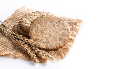 Healthy oatmeal cookies isolated on white backgroundの写真素材