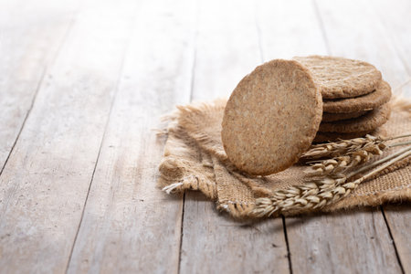 Healthy oatmeal cookies on wooden table