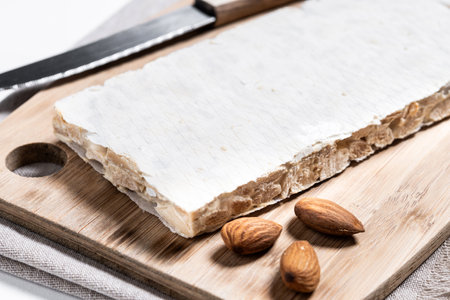 Christmas almond nougat isolated on white background.の写真素材