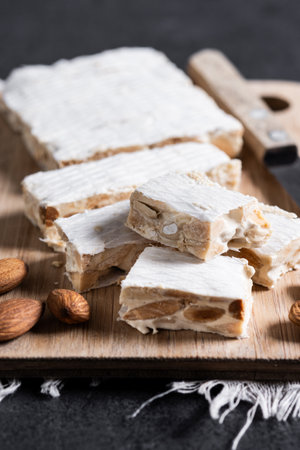 Christmas almond nougat on black slate backgroundの写真素材