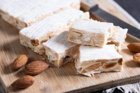Christmas almond nougat on black slate backgroundの写真素材