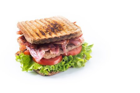 Bacon sandwich with lettuce and tomato isolated on white background. Copy spaceの写真素材