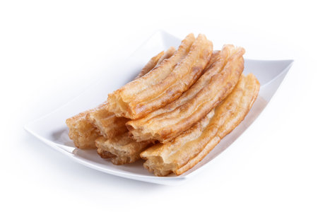 Spanish Churros. Traditional spanish food isolated on white backgroundの写真素材