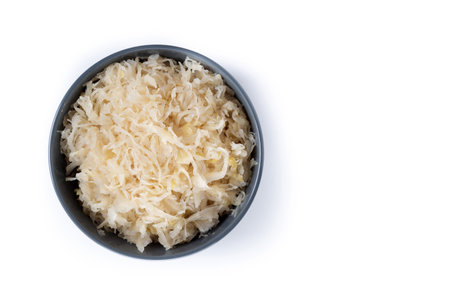 Sauerkraut in a bowl isolated on white backgroundの写真素材