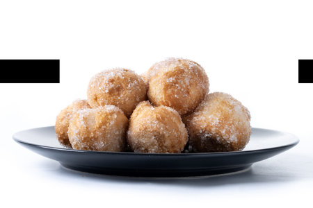 Traditional Carnival fritters or fritters and wind isolated on white background. .