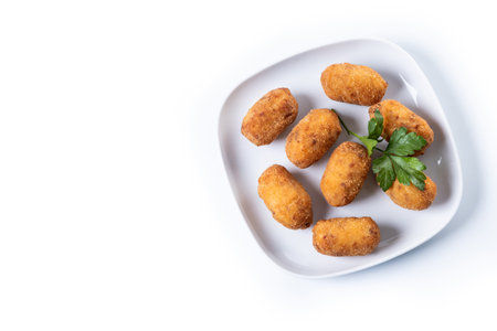 Fried cod croquettes isolated on white backgroundの写真素材