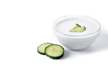 Greek Tzatziki sauce in bowl isolated on white backgroundの写真素材