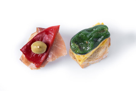 Traditional Spanish pintxos isolated on white background.の写真素材
