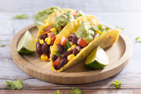 Vegan mexican Taco with beans on wooden tableの写真素材