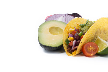 Vegan mexican Taco with beans and guacamole isolated on white background