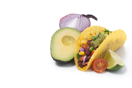 Vegan mexican Taco with beans and guacamole isolated on white backgroundの写真素材