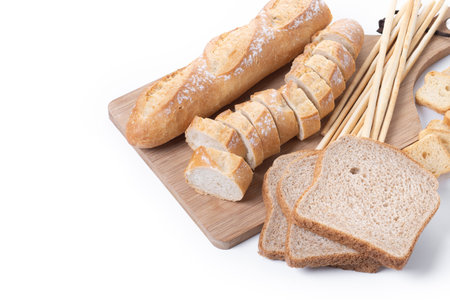 Assortment of Bread Products on white marble background
