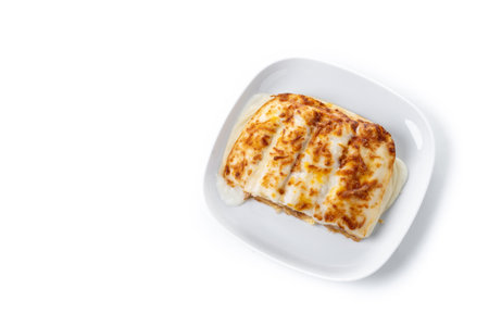 Baked Cannelloni with Cheese and BÃ©chamel Sauce isolated on white backgroundの写真素材
