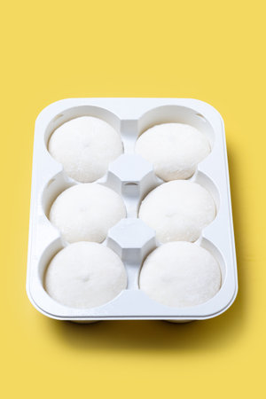 Japanese Mango ice cream mochion yellow backgroundの写真素材