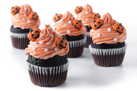 Halloween cupcakes with Halloween sprinkles isolated on white backgroundの写真素材