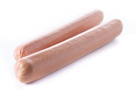 Raw Frankfurt sausages isolated on white backgroundの写真素材