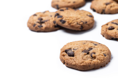 Crispy chocolate chip cookies isolated on white background