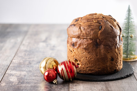 Traditional Italian Panettone on wooden tableの写真素材