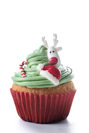 Christmas cupcake with Christmas decoration isolated on whtie backgroundの写真素材