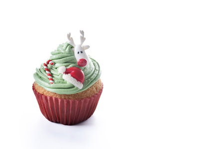 Christmas cupcake with Christmas decoration isolated on whtie backgroundの写真素材