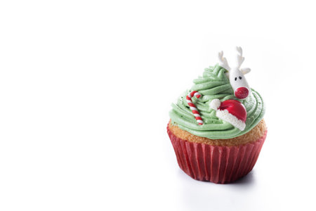 Christmas cupcake with Christmas decoration isolated on white backgroundの写真素材