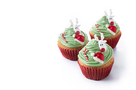 Christmas cupcakes with Christmas decoration isolated on white backgroundの写真素材