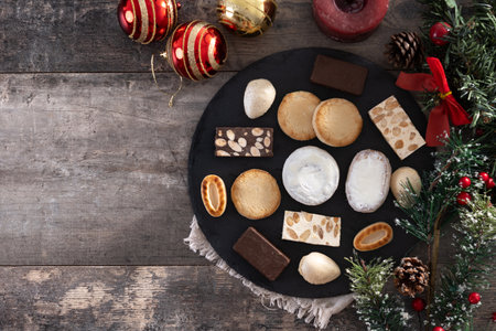 Traditional Spanish Christmas sweets assortment on wooden table.の写真素材