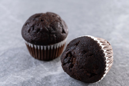 Homemade chocolate muffins pn gray stone backgroundの写真素材