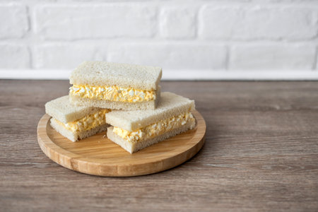 Tamago Sando sandwich on wooden tableの写真素材