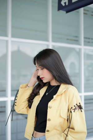 beautiful girl holding hair aloneの写真素材