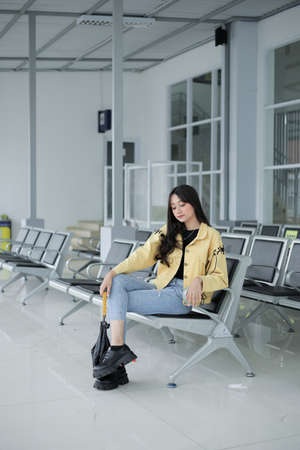 beautiful girl holding hair aloneの写真素材