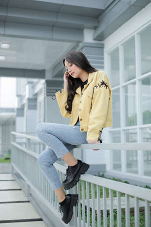 beautiful girl holding hair aloneの写真素材