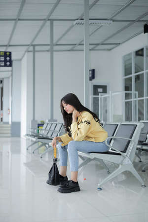 beautiful girl holding hair aloneの写真素材