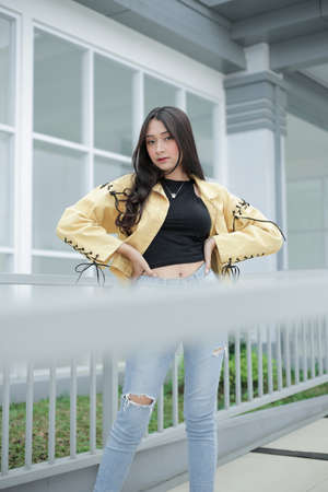 beautiful girl holding hair aloneの写真素材