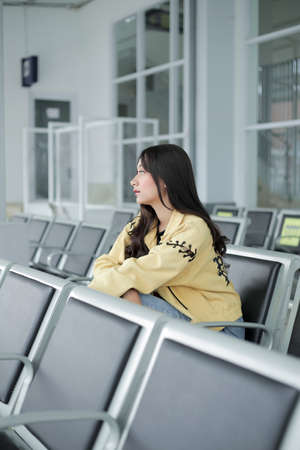 beautiful girl holding hair aloneの写真素材