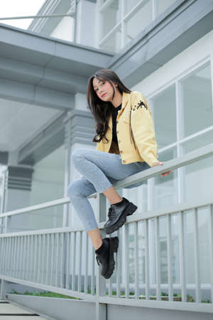 beautiful girl holding hair aloneの写真素材