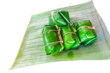 Thai dessert sticky rice with banana isolated on white backgroundの写真素材