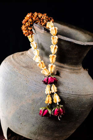 Dried garland flower, thai style isolated on black backgroundの写真素材